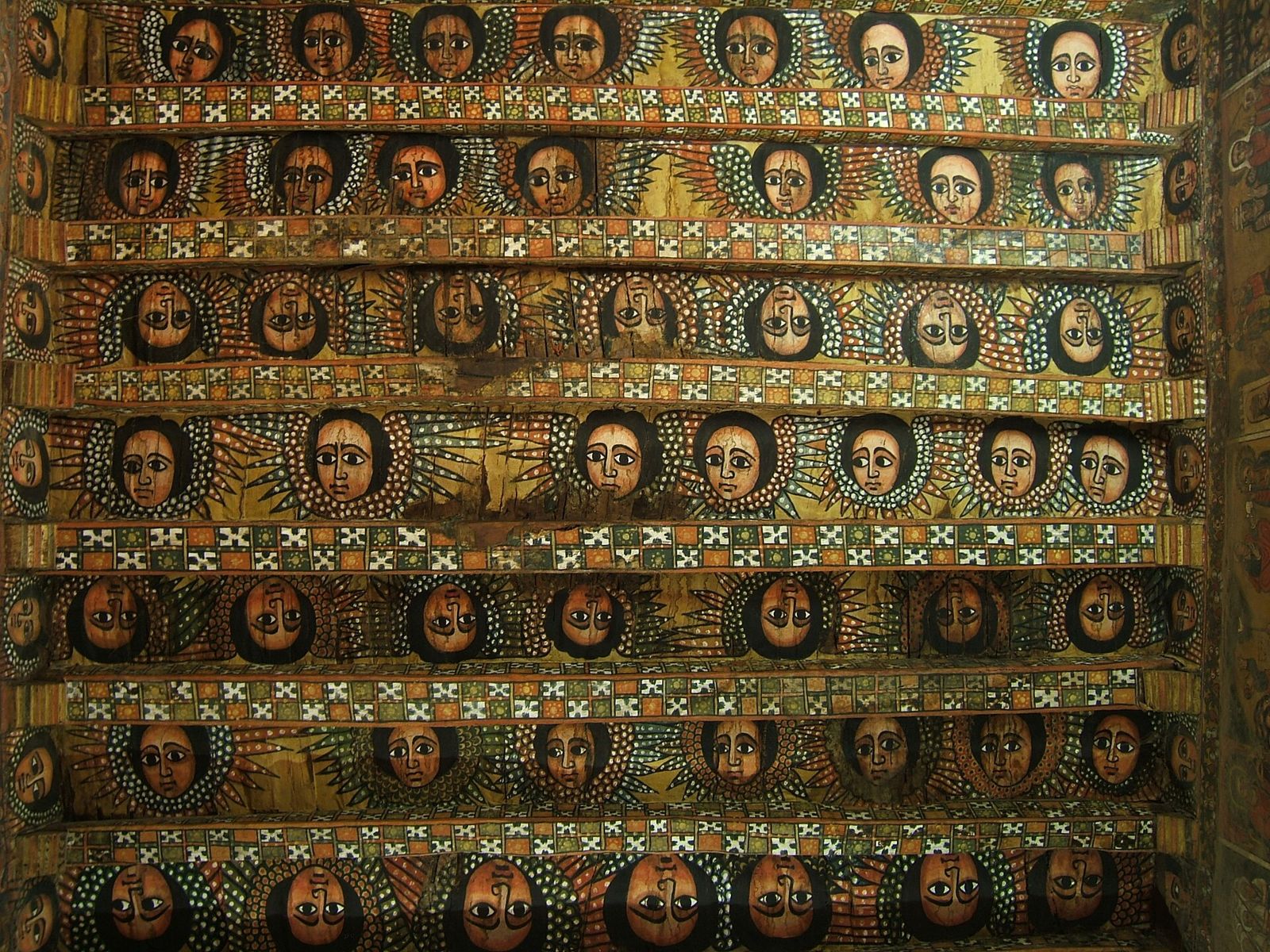 The painted angels of the ceiling of Debre Berhan Selassie, Gondar