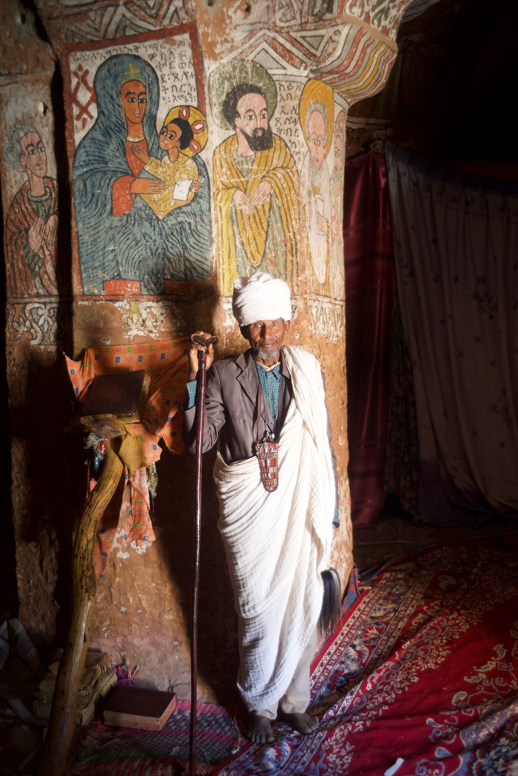 A monk in the rock church of Abuna Yemata Guh
