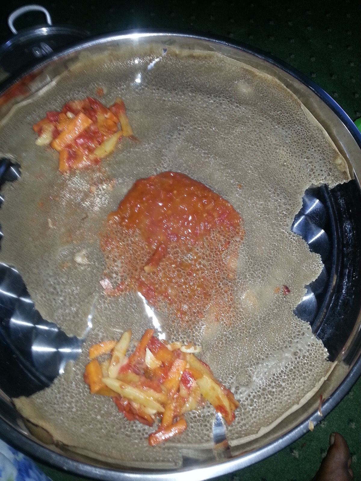 Shiro, a stew of ground chickpeas, served on injera